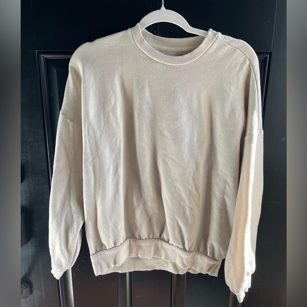 Calia Oversized Sweatshirt
Size: Small
Color: Cream
Material: Modal